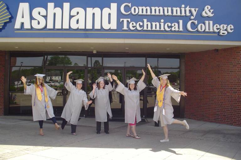 ACTC Grads in front of building