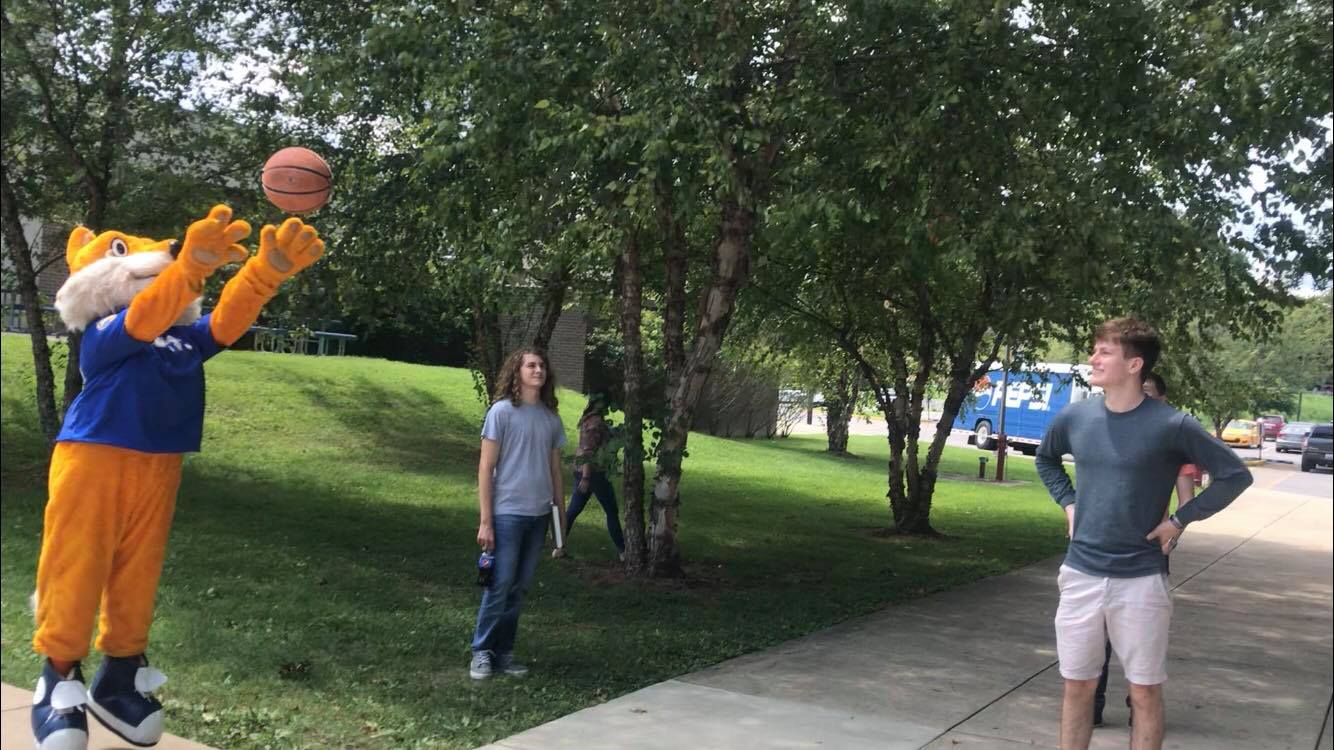 Big Sandy Pathfinder playing basketball with students