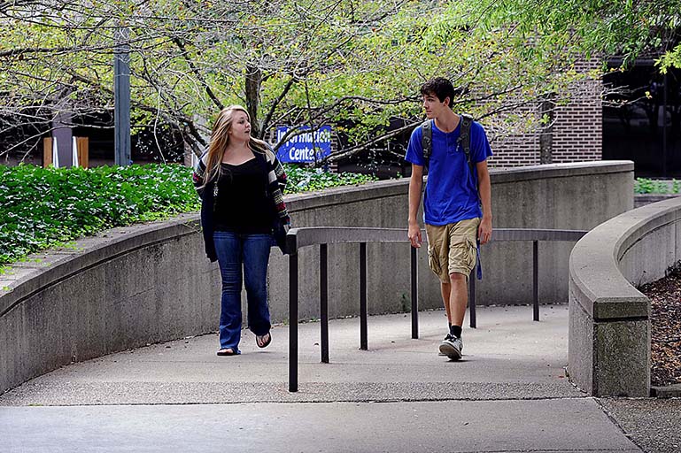 students walking up pathway