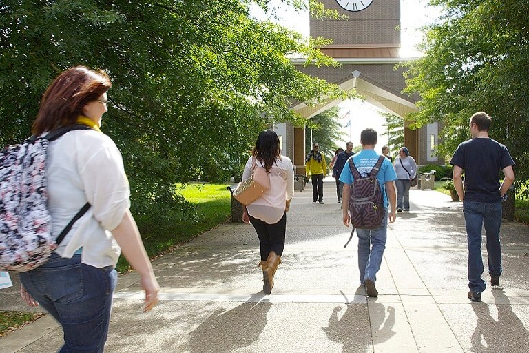 HCC students walking across campus
